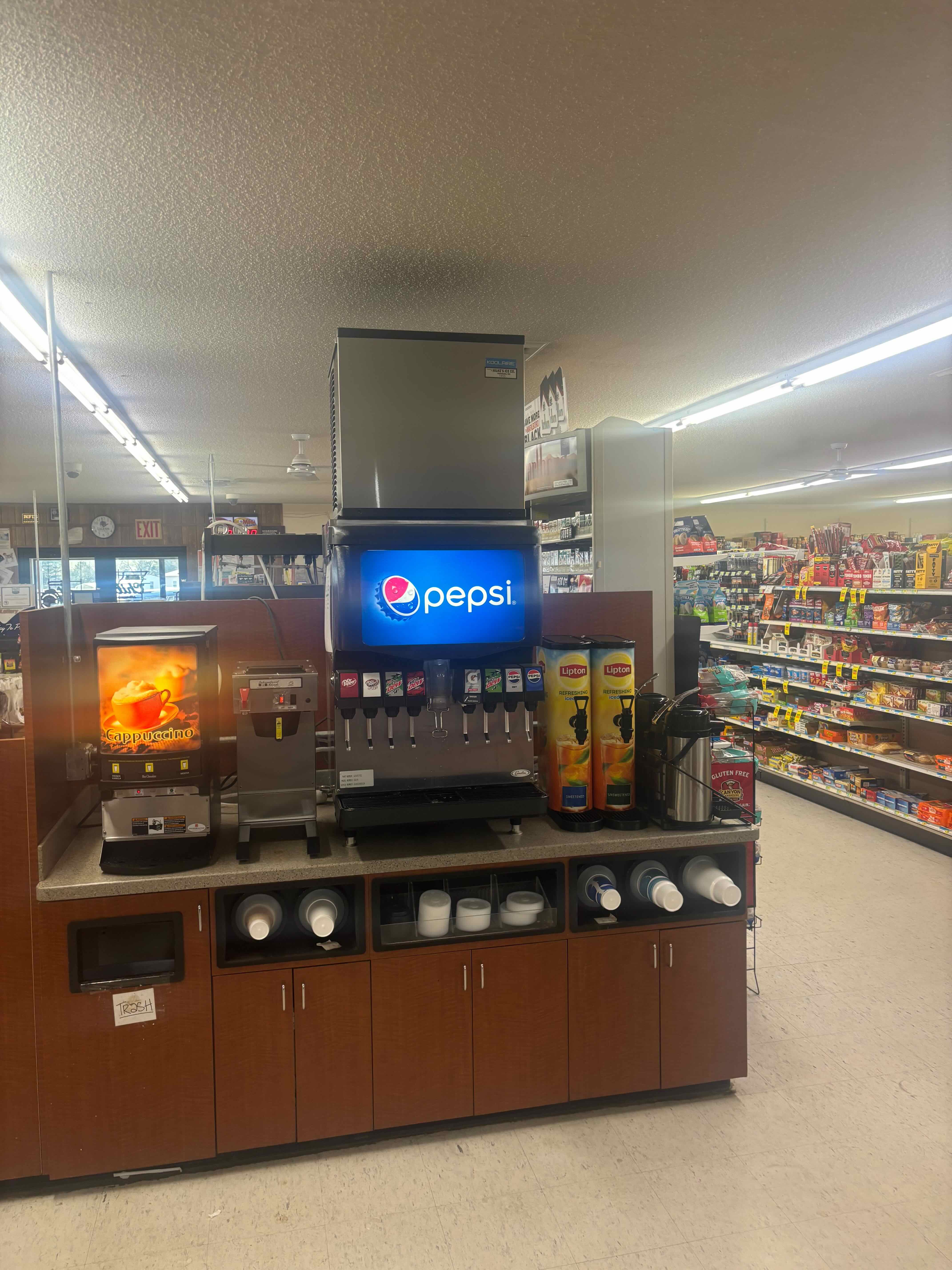 Ice machine installed above a c-store fountain